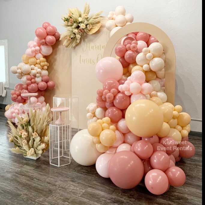 Modular wall panel backdrop in a boho neutral theme for a ceremony