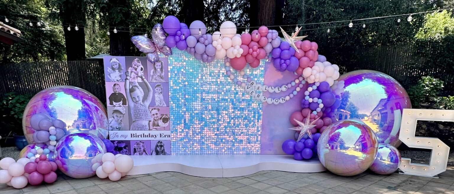 Round eucalyptus wedding ceremony arch with soft draping